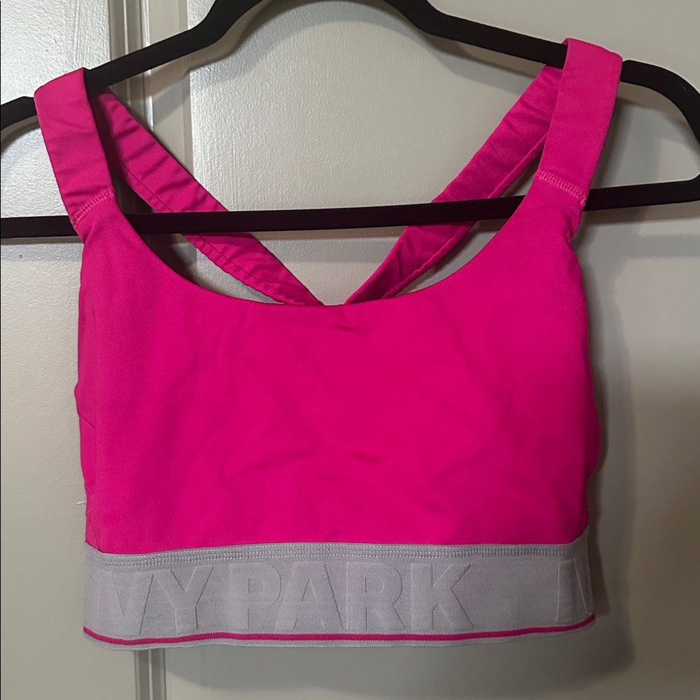 Ivy Park pink sports bra with mesh back panel. Size large.